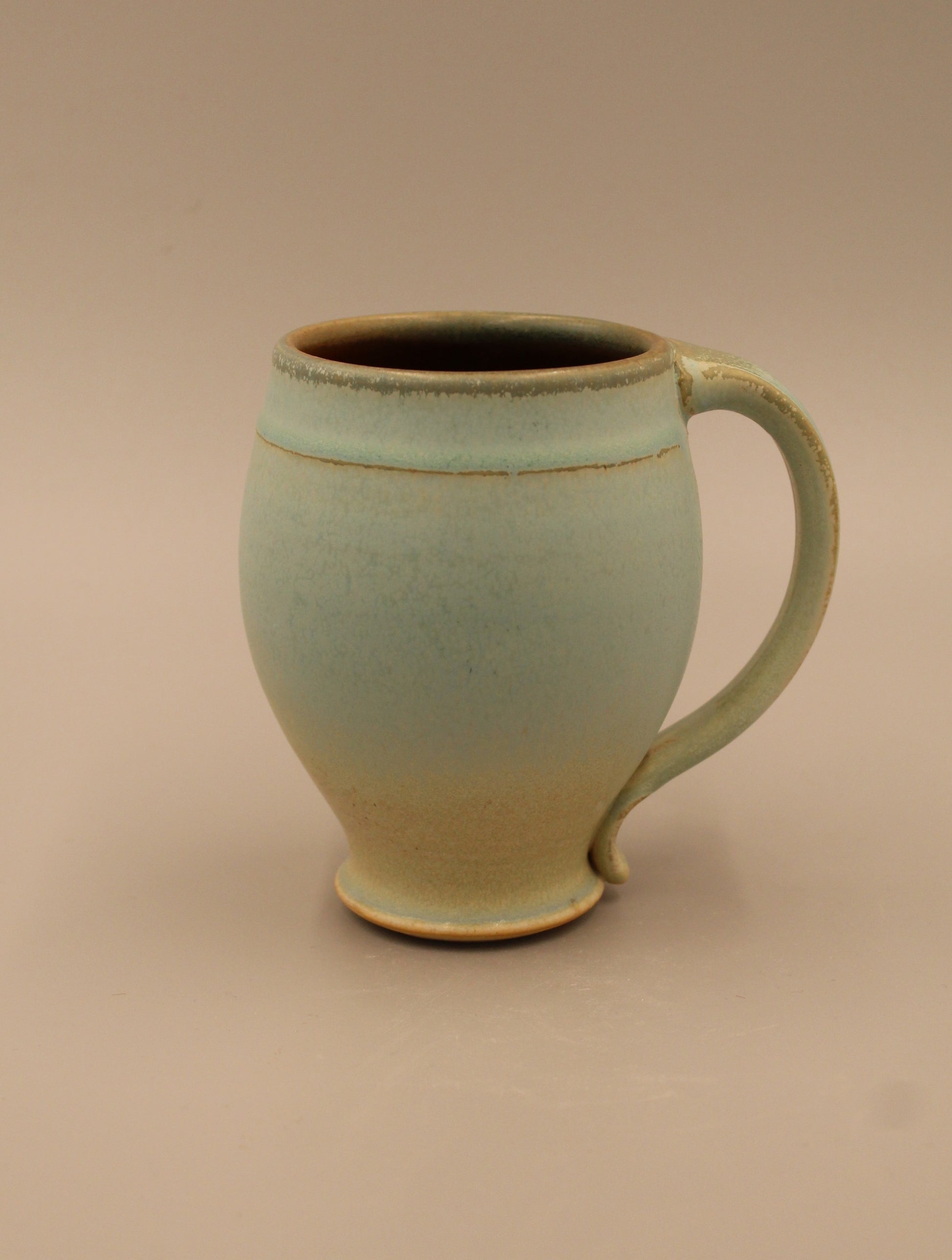 Elegant Light Blue Mug by Ezra Lavinsky Pottery